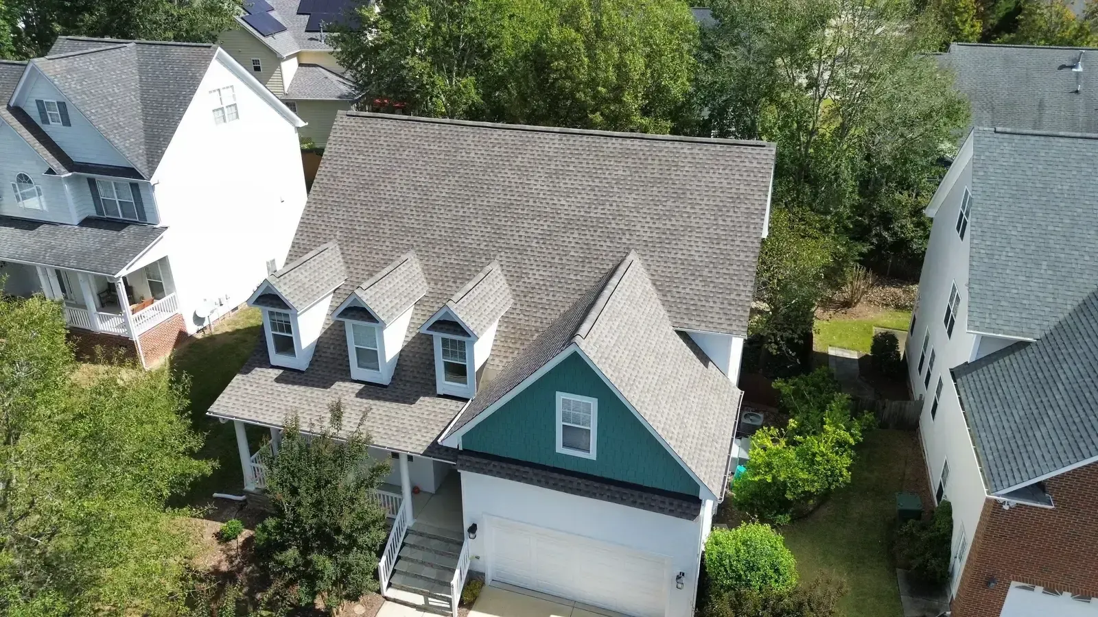 Completed GAF Timberline HDZ Weathered Wood roof replacement on a two-story home on Gravel Brook Ct in Cary, NC